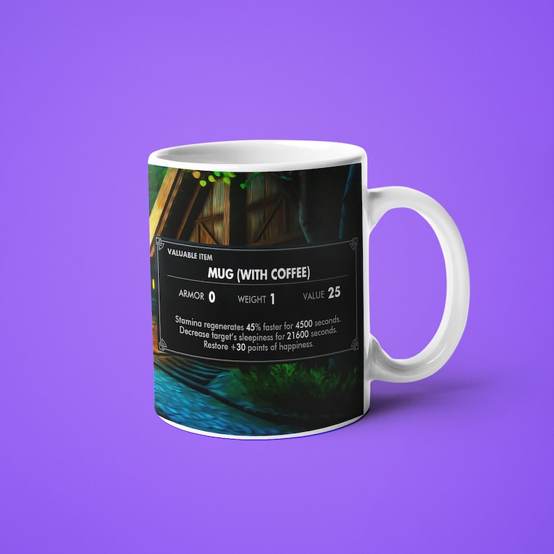 May include: A white ceramic mug with a video game-style graphic of a mug with coffee. The text on the mug reads "VALUABLE ITEM MUG (WITH COFFEE) ARMOR 0 WEIGHT 1 VALUE 25 Stamina regenerates 45% faster for 4500 seconds. Decrease target's sleepiness for 21600 seconds. Restore +30 points of happiness."