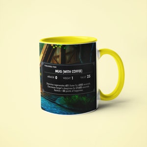 May include: A yellow and white mug with a video game-style graphic of a mug with coffee. The text on the mug reads "VALUABLE ITEM MUG (WITH COFFEE) ARMOR 0 WEIGHT 1 VALUE 25 Stamina regenerates 45% faster for 4500 seconds. Decrease target's sleepiness for 21600 seconds. Restore +30 points of happiness."