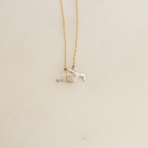 Dainty Girl on Swing Necklace, Two Tone, Play Time Childhood Memories, Nostalgic Gold Minimalist Jewelry, Perfect Gym Teacher, Friend Gift May include: A gold chain necklace with a silver pendant of a person swinging on a swing