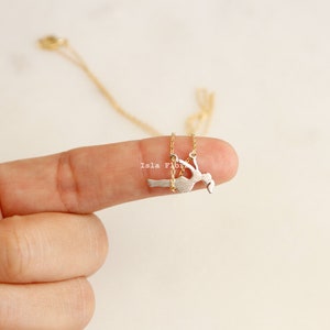 Dainty Girl on Swing Necklace, Two Tone, Play Time Childhood Memories, Nostalgic Gold Minimalist Jewelry, Perfect Gym Teacher, Friend Gift May include: A gold chain necklace with a silver pendant of a woman swinging on a swing.