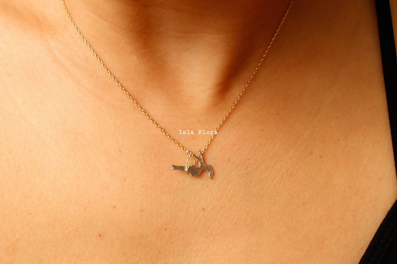 Dainty Girl on Swing Necklace, Two Tone, Play Time Childhood Memories, Nostalgic Gold Minimalist Jewelry, Perfect Gym Teacher, Friend Gift May include: A gold chain necklace with a pendant of a woman in a yoga pose. The pendant is made of silver and is hanging from the chain. The text 'Isla Flora' is visible on the pendant.