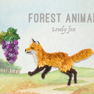 May include: An embroidered image of a fox and grapes. The fox is orange and brown, with a white face and black legs. The grapes are purple and green. Text reads "FOREST ANIMAL" and "Lovely fox". The background is a watercolour landscape.