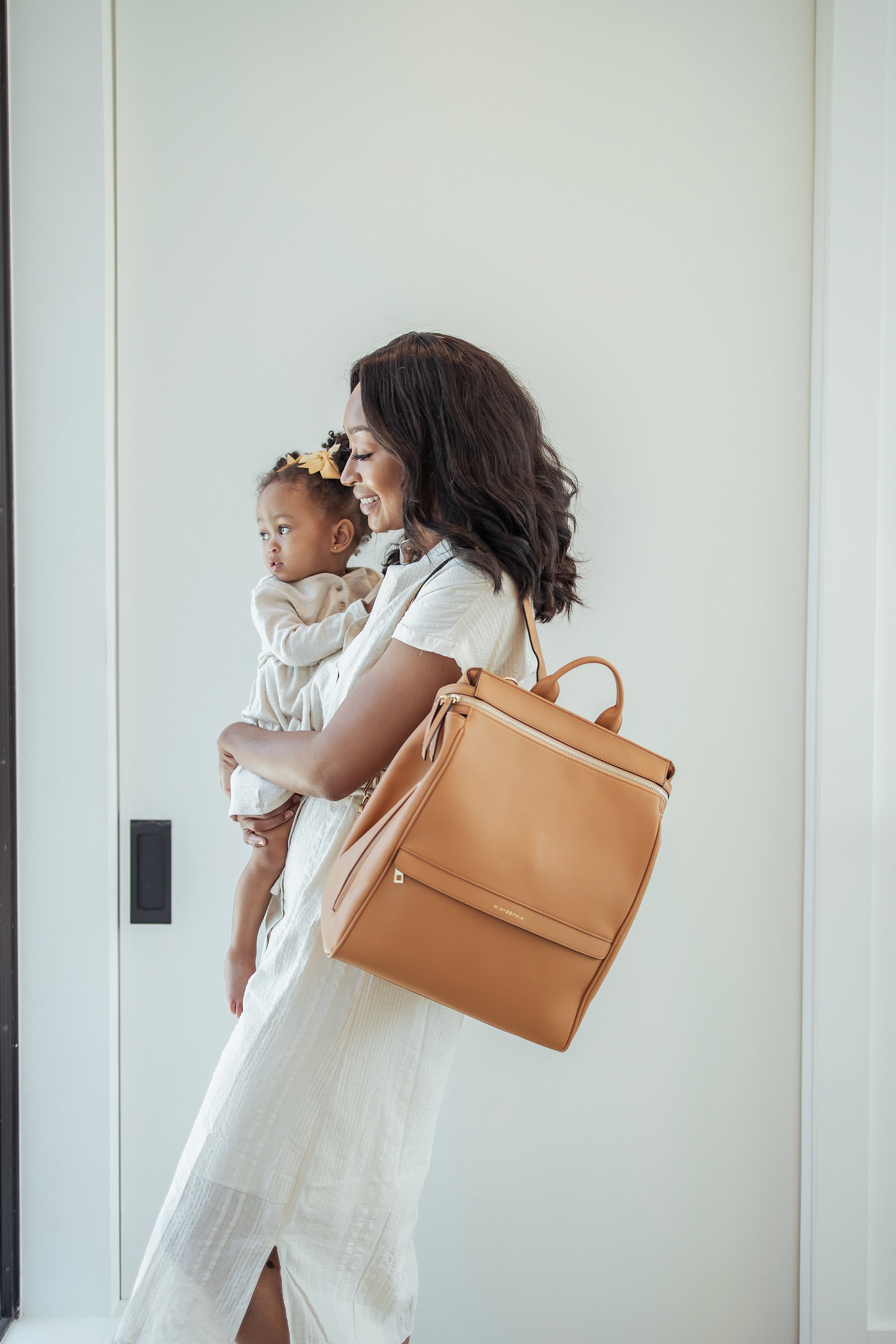 Mia + Sophia Leather Diaper Bag Backpack with Changing Pad, Stroller Straps, Bottle Holder (Black Sophia) Medium