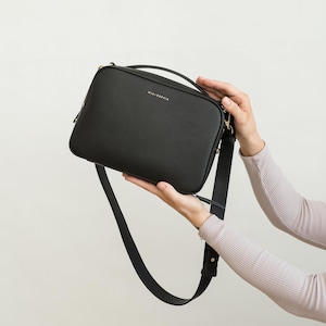 Crossbody Diaper Clutch Includes Leather Changing Pad and Removable Pouch Organizer