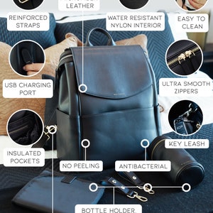 May include: Black diaper bag with gold hardware, featuring multiple pockets, a water-resistant nylon interior, and a key leash. The bag is made of premium microfiber leather and has reinforced straps, insulated pockets, and ultra-smooth zippers.