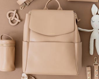 Windel-Rucksack aus Leder: Designer-Babytasche mit USB-Anschluss