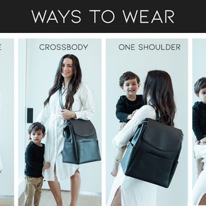 May include: A black leather diaper bag with multiple carrying options, including top handle, crossbody, one shoulder, and backpack. The bag is shown being worn by a person in each style.