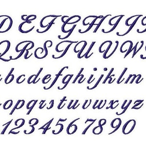 May include: A full cursive alphabet and number set in dark blue. Uppercase and lowercase letters are shown, along with the numbers 1 to 0. The font is elegant and flowing, suitable for various design projects.