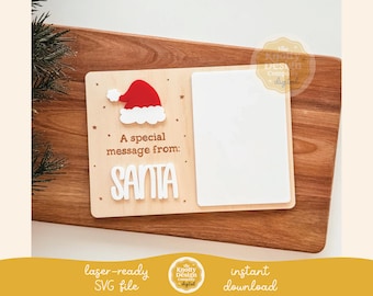 May include: A wooden sign with a red and white Santa hat and the text "A special message from: SANTA". The sign has a blank space for writing a message.