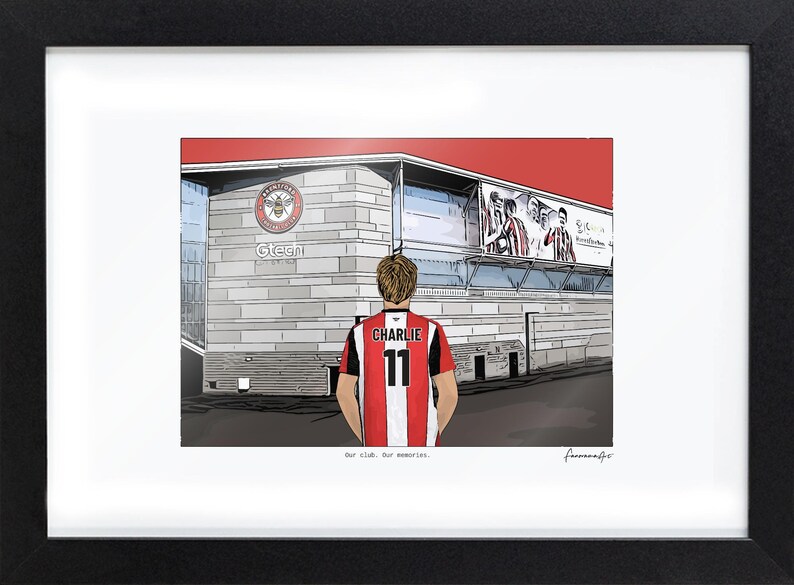 May include: A framed illustration of a person wearing a red and white striped jersey with the name CHARLIE and number 11 on the back, standing before the Gtech Community Stadium. The text Our club. Our memories. is printed at the bottom.
