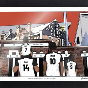 May include: A framed illustration of a family wearing white and black soccer jerseys with names and numbers, standing before The Fulham Football Club stadium. The text reads THE FULHAM FOOTBALL CLUB, PUTNEY END, and Making memories at Craven Cottage.