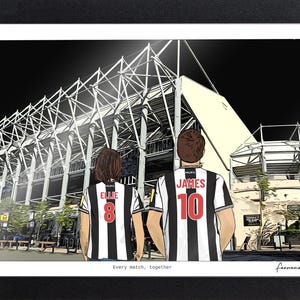 May include: A framed digital illustration showing two people from behind, wearing black and white striped soccer jerseys with the names ELLIE and JAMES and numbers 8 and 10. They stand before a large stadium at night. Text reads: Every match, together.