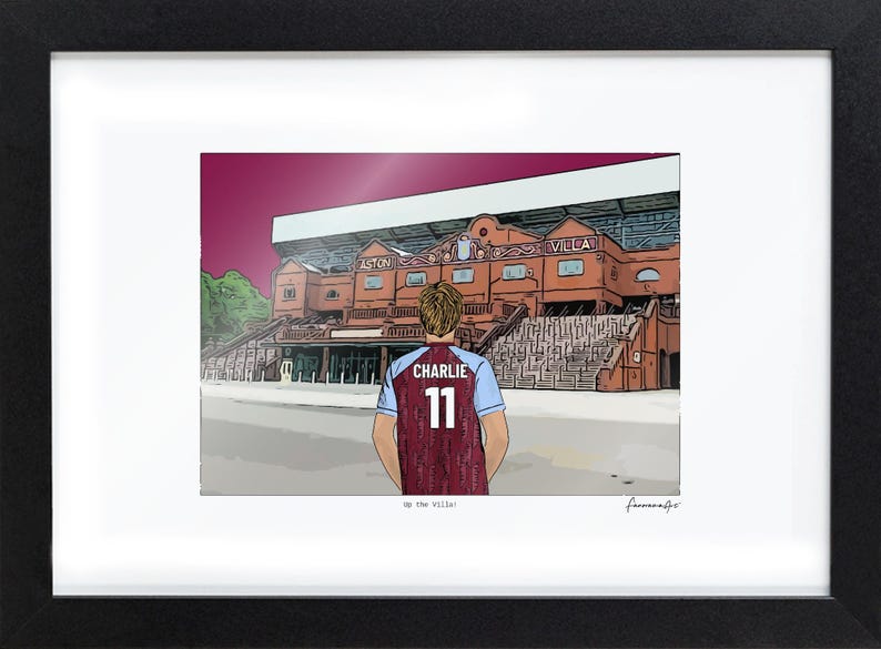 May include: A framed illustration of a person seen from behind, wearing a claret and blue soccer jersey with the name CHARLIE and number 11 printed on the back, standing before the Aston Villa stadium. The text Up the Villa! is printed below.