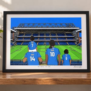 May include: A framed digital illustration of a family of four wearing blue soccer jerseys with names and numbers on the back, standing in a stadium. The jerseys are labeled Max 7, Dad 14, Mum 10, and Ava 9. The text Our family. Our club. is printed below.