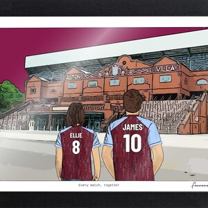 May include: A framed illustration of two people from behind, wearing maroon and light blue soccer jerseys with the names Ellie and James and numbers 8 and 10. They stand before a large stadium with the text Aston Villa. Text reads: Every match, together.