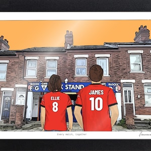 May include: A framed illustration showing two individuals from behind wearing red jerseys with the names Ellie and James and numbers 8 and 10. They stand before a brick building with a blue sign reading Blocks Gate 6 Park Stand. The text Every match, together is printed below the illustration.