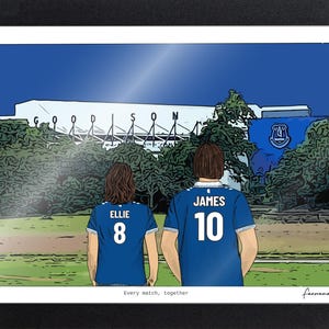Personalised Everton A4 print in a black landscape frame, showing Ellie and James with custom shirt names and numbers.