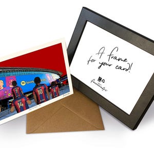 May include: A greeting card featuring a colorful illustration of soccer players in blue and red jerseys standing before a stadium with a Spotify logo, accompanied by a brown envelope and a black picture frame with the text A frame for your card.