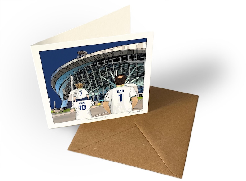 May include: A square greeting card featuring a cartoon illustration of a family walking toward a large stadium. The figures wear white jerseys with the text DAD 1, MUM 10, and IVY 7. The text Happy Birthday, Dad is printed at the bottom.