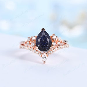 Blue sandstone engagement ring set pear cut rose gold ring set vintage bridal set unique curve wedding band antique galaxy ring