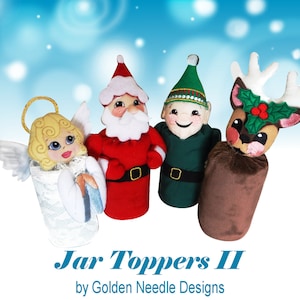 Op de afbeelding: Een verzameling feestelijke potdekselopzetstukken met een engel, de kerstman, een elf en een rendier. De engel draagt een witte jurk en heeft een gouden halo. De kerstman draagt een rood pak. De elf is groen. Tekst: "Jar Toppers II".