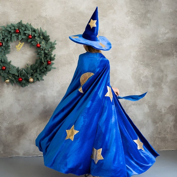 Enchanting Adult Blue Wizard Halloween Costume Set: Cape, Hat, and Magic Wand.