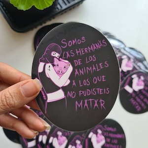 Vegan sticker feminist girl rescuing animal veganism activism animal liberation vegan art spanish spanish