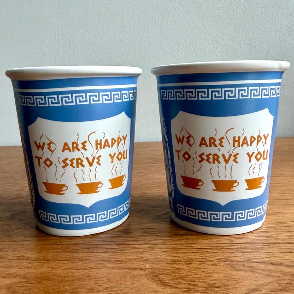 Pair of 'We are Happy To Serve You' New York City Greek Ceramic Coffee Cups