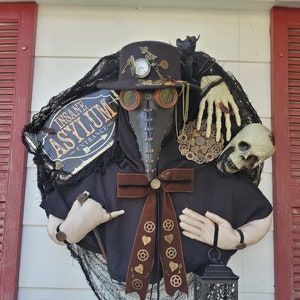 Steampunk,the plague doctor, Halloween wreath,gas mask looks like leather,light up lantern, gears,skeleton and skeleton hand,rat,cockroaches