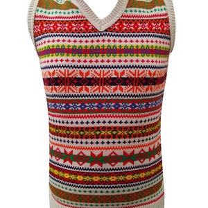 May include: A beige sleeveless sweater with a colorful geometric pattern. The pattern features stripes of red, orange, yellow, green, blue, and purple.