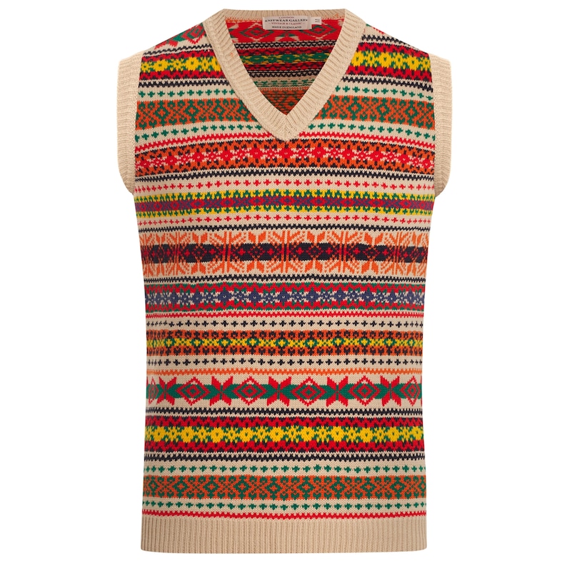 May include: A beige sleeveless sweater with a V-neck and a colorful geometric pattern. The pattern features red, orange, yellow, green, blue, and black stripes and designs.