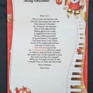 May include: A red and white Christmas card with a handwritten poem from Santa Claus to Chloe. The poem is about the magic of Christmas and the joy of giving. The card features a piano keyboard and a red and white Santa Claus illustration.