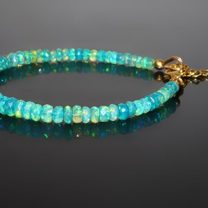 thumbnail image 2 of Natural Ethiopian Fire Opal Beads – 7'' Strand, Purple Translucent, 3.5-5mm Round (F3192) 2 of 3