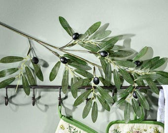 May include: A green olive branch with black olives, perfect for adding a touch of nature to your home decor.