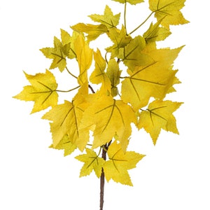 May include: A single stem of artificial fall foliage with yellow maple leaves.