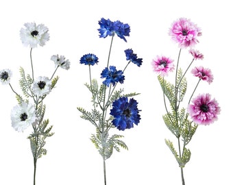 May include: Three artificial flower stems with different colored blooms. The stems are white, blue, and pink. Each stem has multiple blooms.