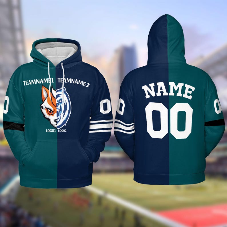 May include: A blue and green hoodie with a split design. One side features a fox and bear logo with the text "TEAMNAME1 TEAMNAME2" and the other side has the text "NAME 00".