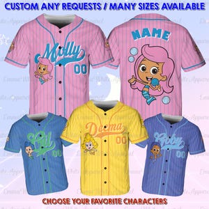 May include: Baseball jerseys in pink, blue, and yellow with character graphics and names. The jerseys have pinstripes and the text "CUSTOM ANY REQUESTS / MANY SIZES AVAILABLE" and "CHOOSE YOUR FAVORITE CHARACTERS".