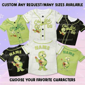 May include: Baseball jerseys in various colors, including green, black, and white, with vertical stripes. Each jersey features a cartoon turtle playing a ukulele and the text "Olu Mel" or "NAME" with the number "00". The text "CUSTOM ANY REQUEST/MANY SIZES AVAILABLE" is at the top.
