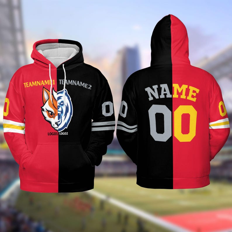 May include: A black and red hoodie with a split design. One side features a black and white logo with the text "TEAMNAME1 TEAMNAME2 LOGO1 LOGO2". The other side features the text "NAME 00" in white and yellow.