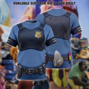 May include: A blue short-sleeved t-shirt featuring a printed police uniform design with a black chest plate, a gold police badge, and a utility belt with pouches. The text AVAILABLE SIZES FOR KID/YOUTH/ADULT is printed at the top of the image.