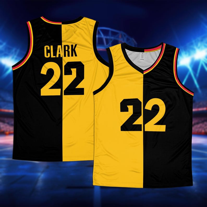 May include: Black and yellow basketball jersey with the name "CLARK" and the number "22" on the back.