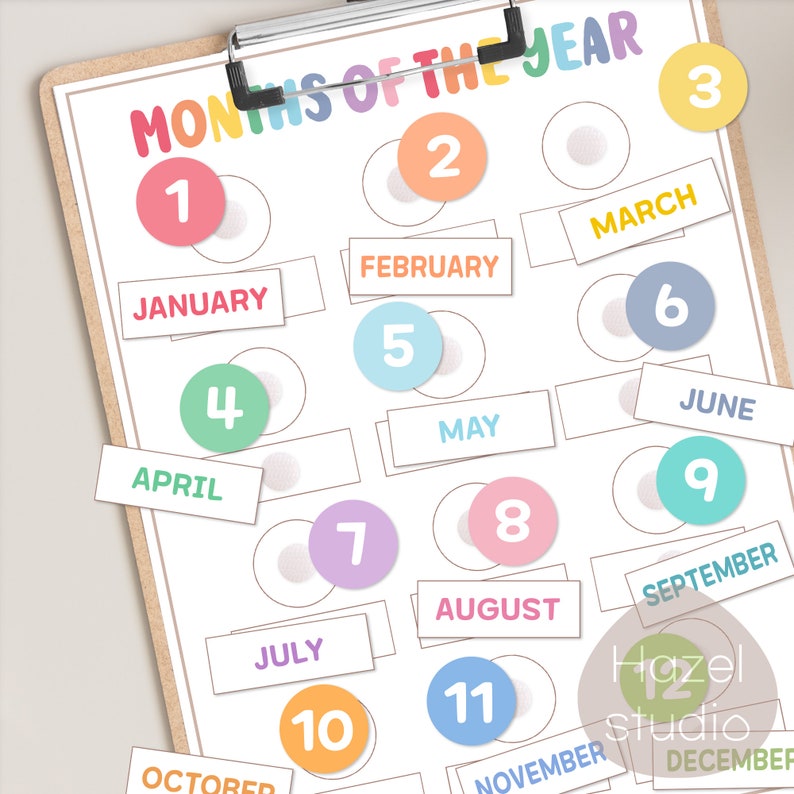 May include: A printable chart with the months of the year, numbered 1 through 12, with colorful circles and labels for each month. The chart is designed for educational purposes, helping children learn the order of the months.