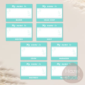 May include: Six turquoise blue name tags with white text and a floral design. The text on the name tags reads "My name is" followed by the job title: Baker, Head Chef, Hostess, Host, Cook, Waitress, and Manager.