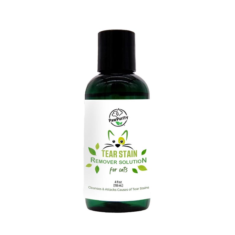 Puede incluir: Una botella verde de soluci&oacute;n removedora de manchas de l&aacute;grimas PawPurity para gatos. La botella est&aacute; etiquetada con una ilustraci&oacute;n de gato y el texto "TEAR STAIN REMOVER SOLUTION for cats". La botella contiene 118 ml de soluci&oacute;n.