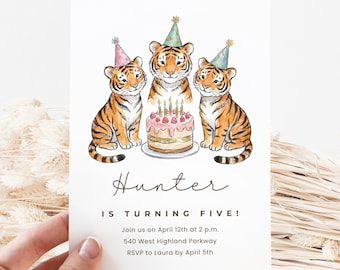 May include: A white invitation card featuring three cartoon tigers wearing party hats, gathered around a birthday cake with lit candles. The text reads "Hunter is turning five!" with event details.