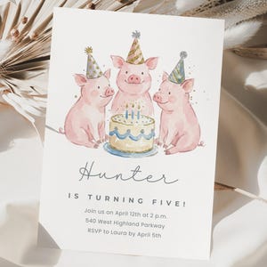 May include: A birthday invitation featuring three pink pigs wearing party hats, gathered around a cake with lit candles. The invitation reads "Hunter is turning five!" and includes event details.