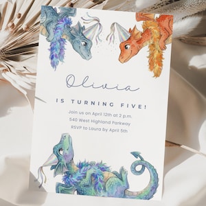 May include: A birthday invitation featuring watercolor illustrations of dragons in blue and orange. The text reads "Olivia IS TURNING FIVE!" with event details below. The invitation is decorated with party hats and streamers.