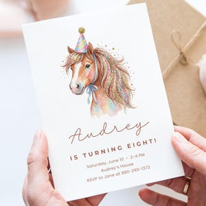 Watercolor horse with party hat on a birthday invitation for Audrey.