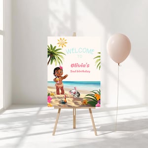 May include: A rectangular welcome sign on a wooden easel featuring a cartoon girl, a pig, and a rooster on a beach. The text reads "WELCOME TO Olivia's 2nd birthday" in pink and blue. A pale pink balloon is tied to the side of the easel.
